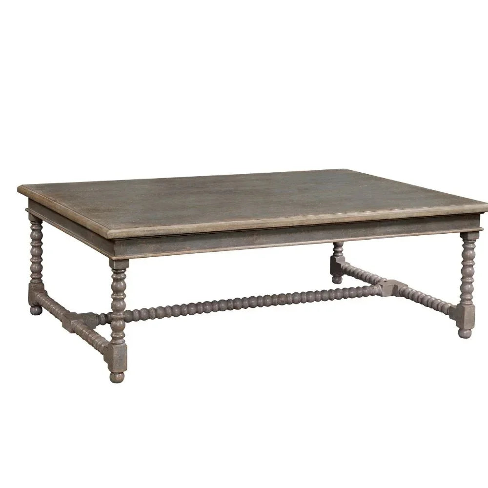 Rustic farmhouse coffee table with turned spindle legs and weathered gray finish