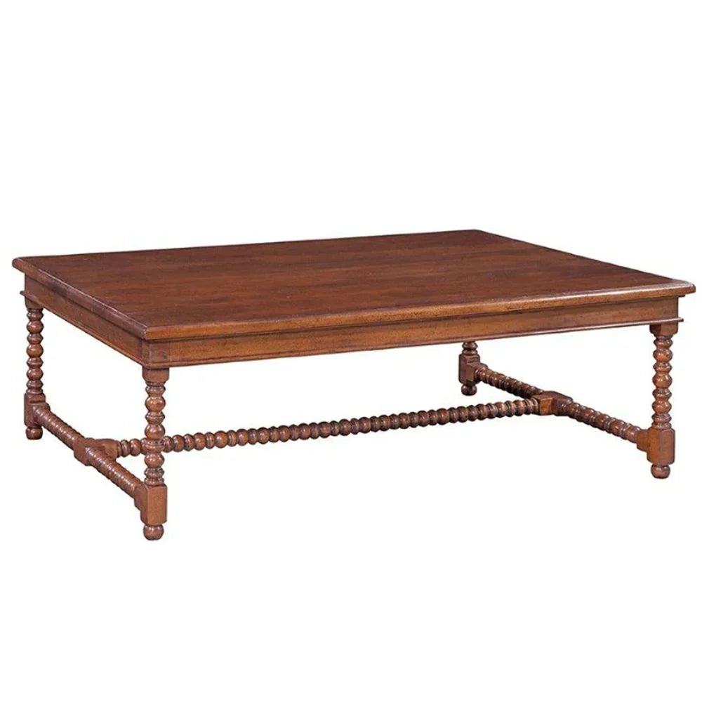 French country brown stained coffee table with turned spindle legs and rustic wood finish