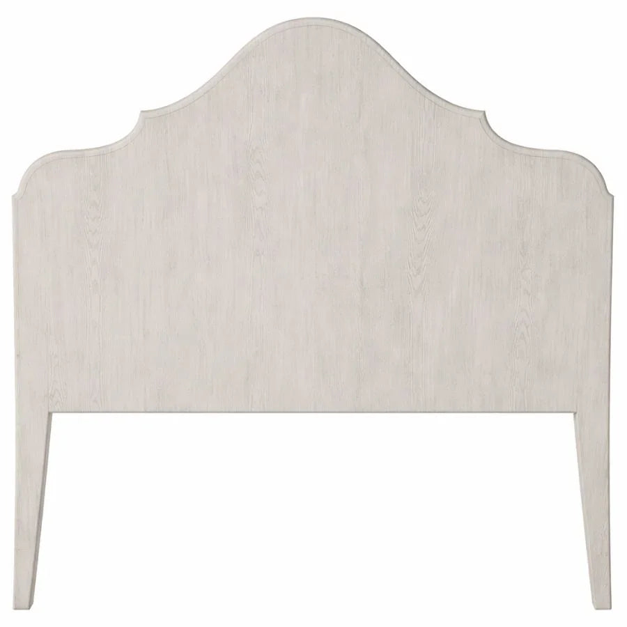White washed wood headboard with curved top, French country style bedroom furniture