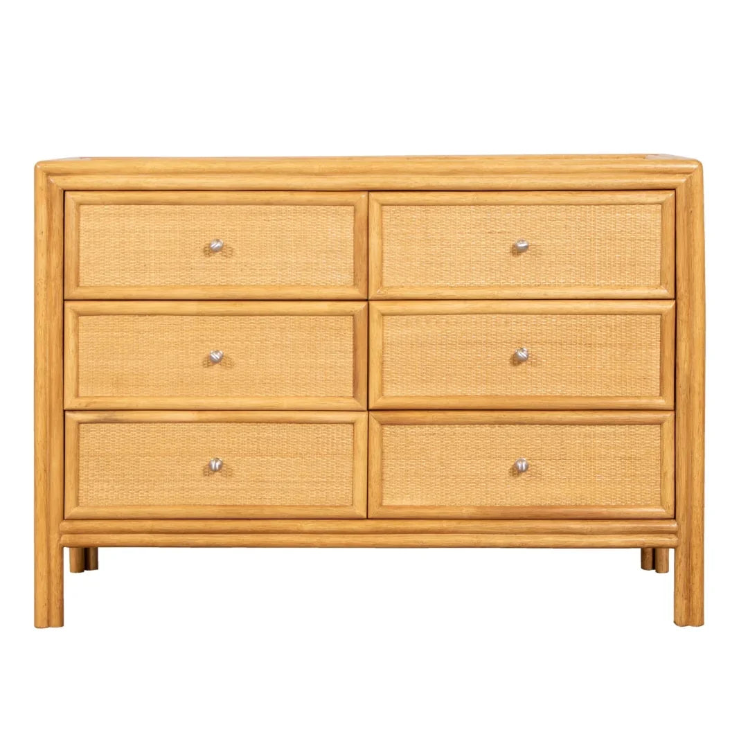 Natural boho 6-drawer dresser with light wood frame and woven rattan panels.