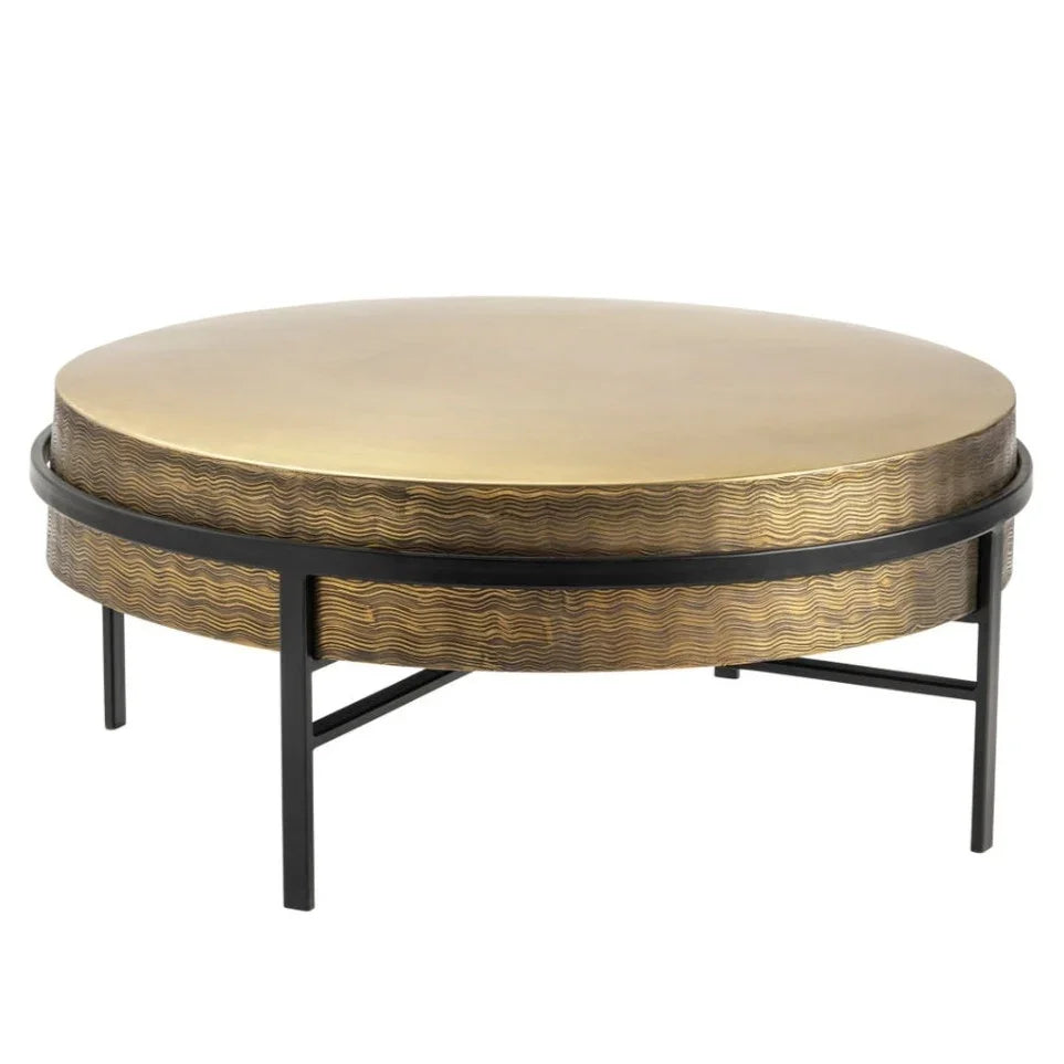 Round gold coffee table with wavy texture and black metal frame, ideal for farmhouse or boho decor
