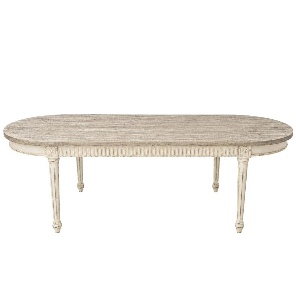 Elegant shabby chic oval dining table with distressed white finish and carved legs