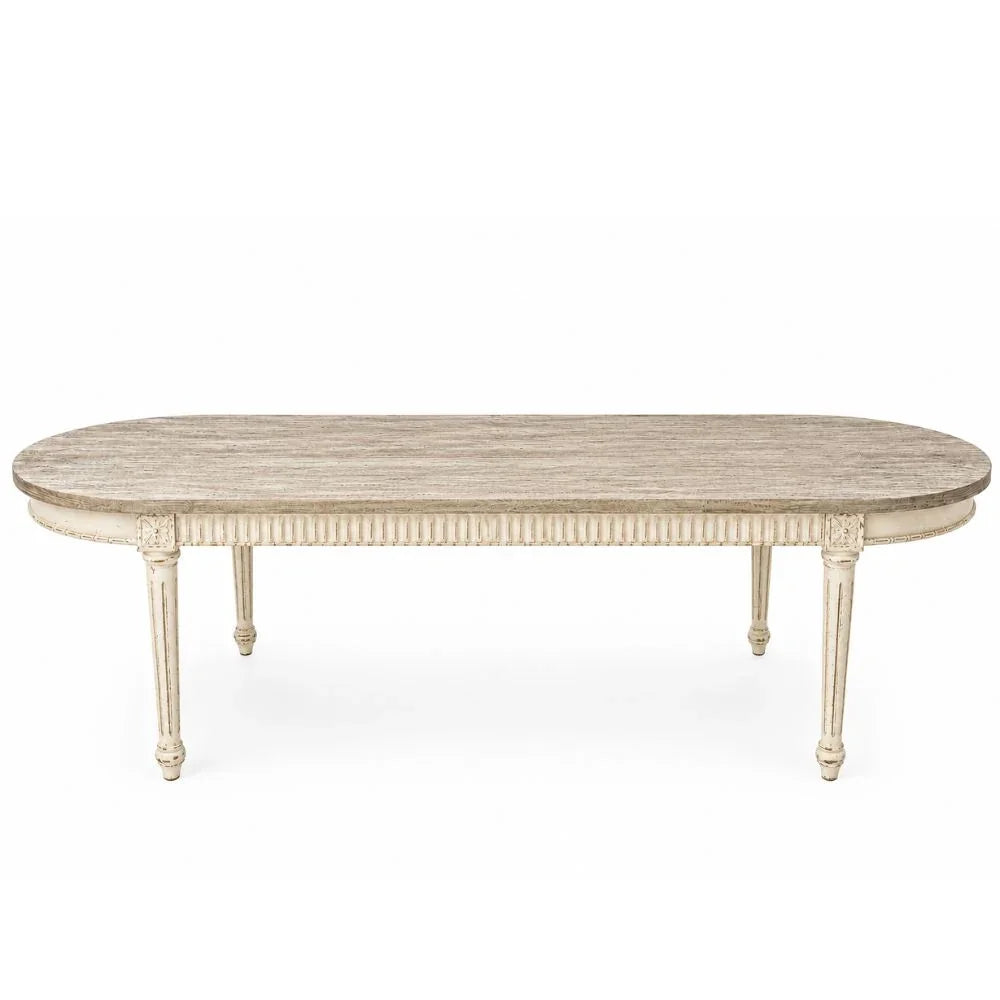 Elegant shabby chic oval dining table with distressed finish and carved legs, perfect for French country decor