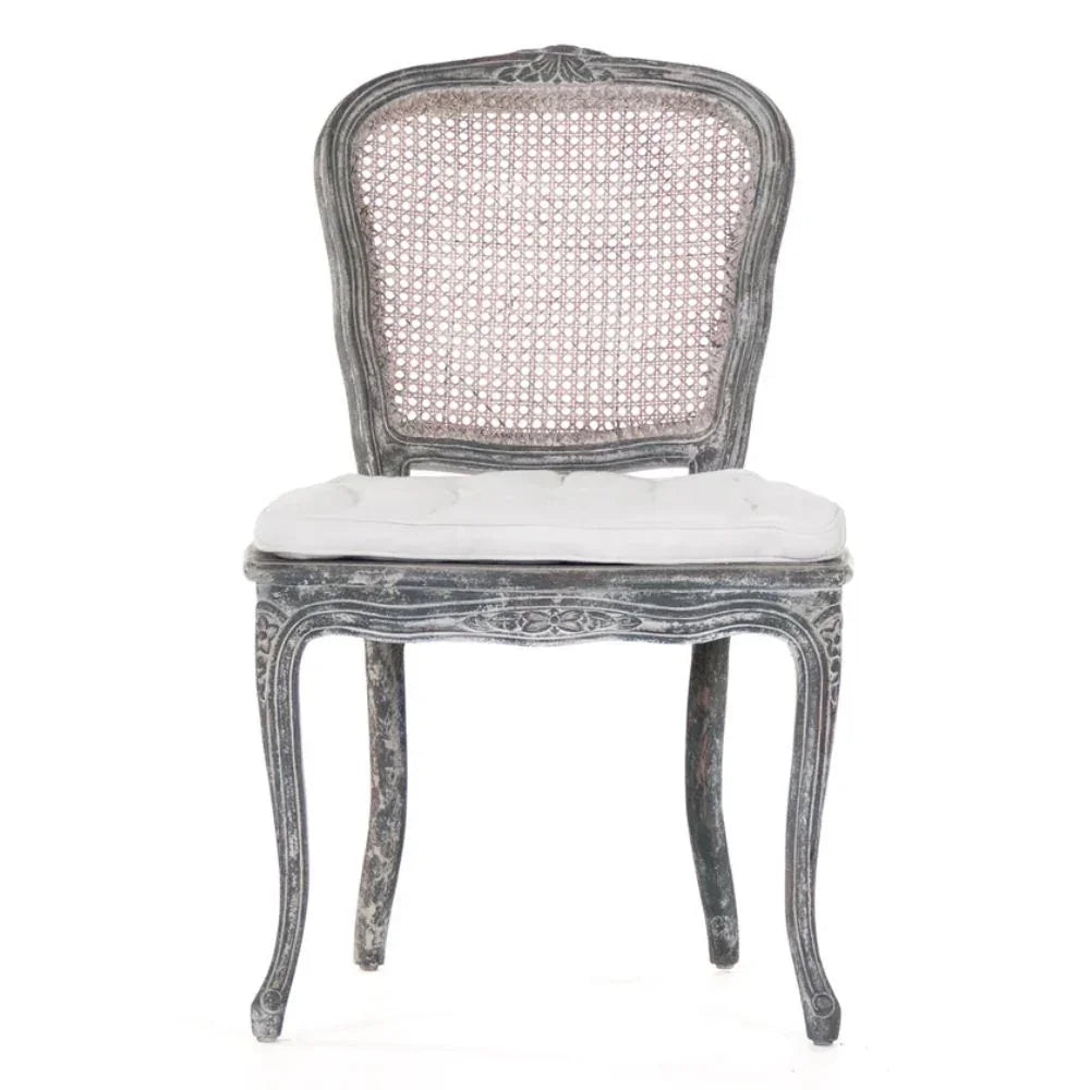 Distressed gray French country cane back chair with white cushion, shabby chic style