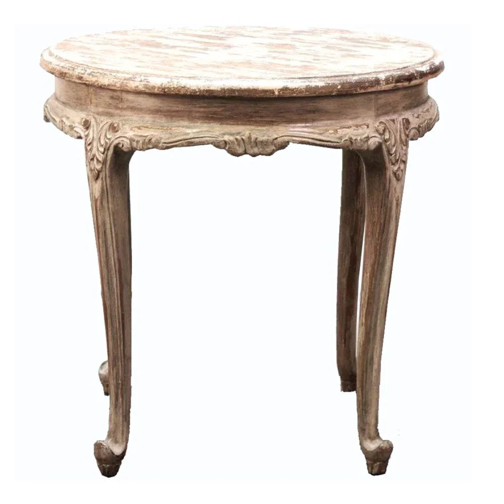 Shabby chic round side table with carved legs and distressed finish, perfect for French country decor