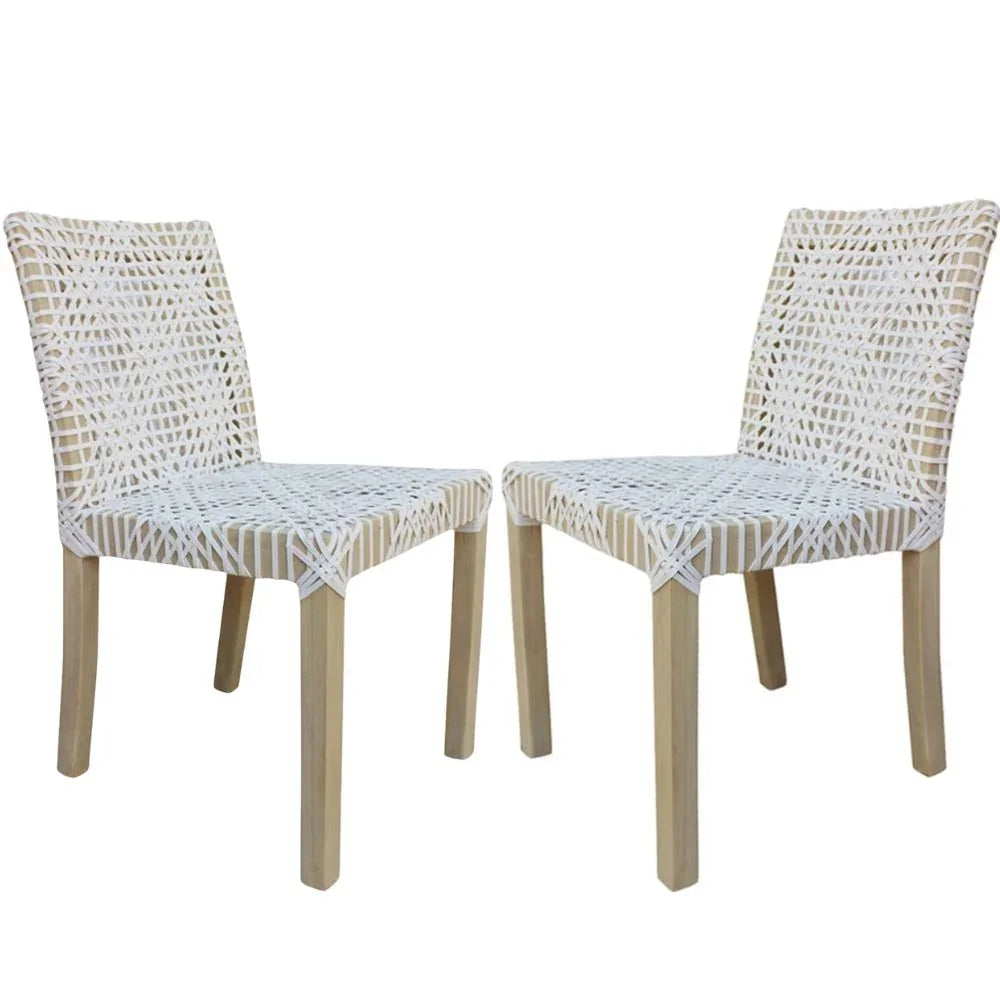 White woven dining chairs with natural wood legs, coastal boho style
