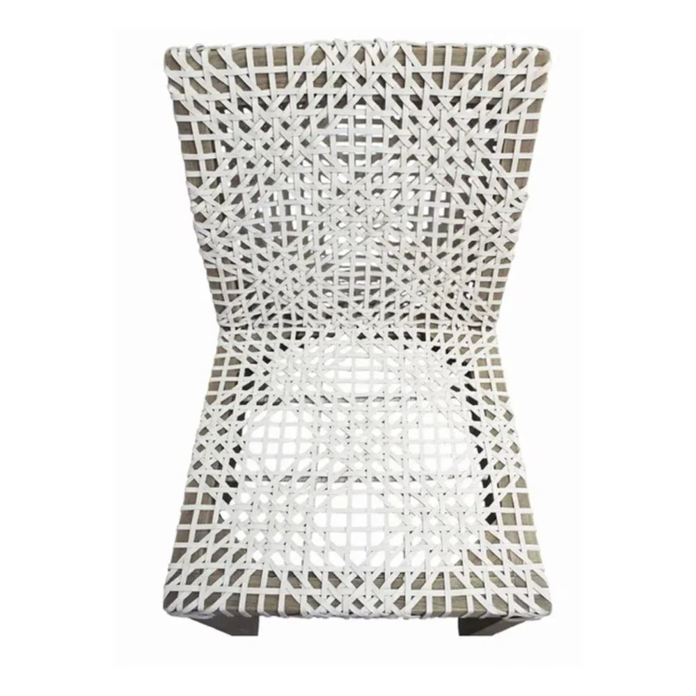 White woven lattice chair in coastal or boho style with open geometric pattern