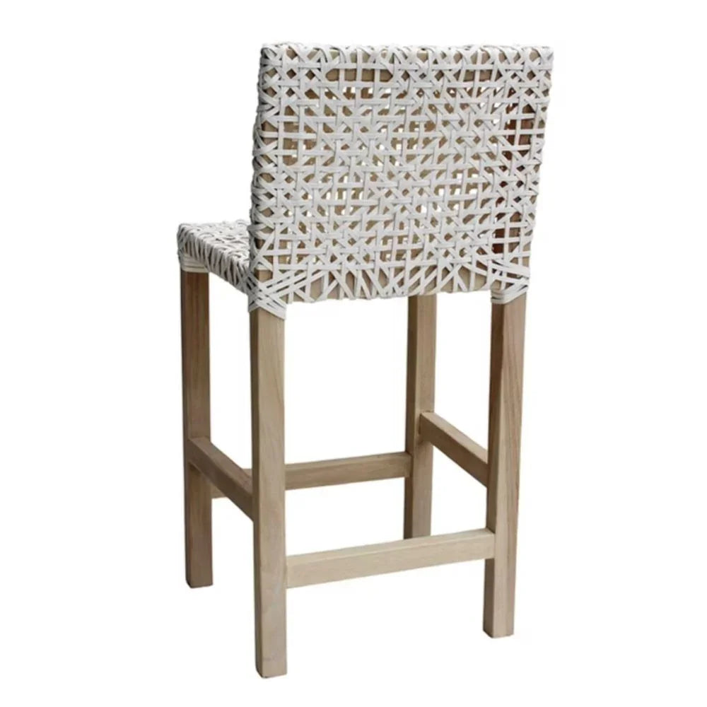 White woven bar stool with natural wood legs, coastal boho style