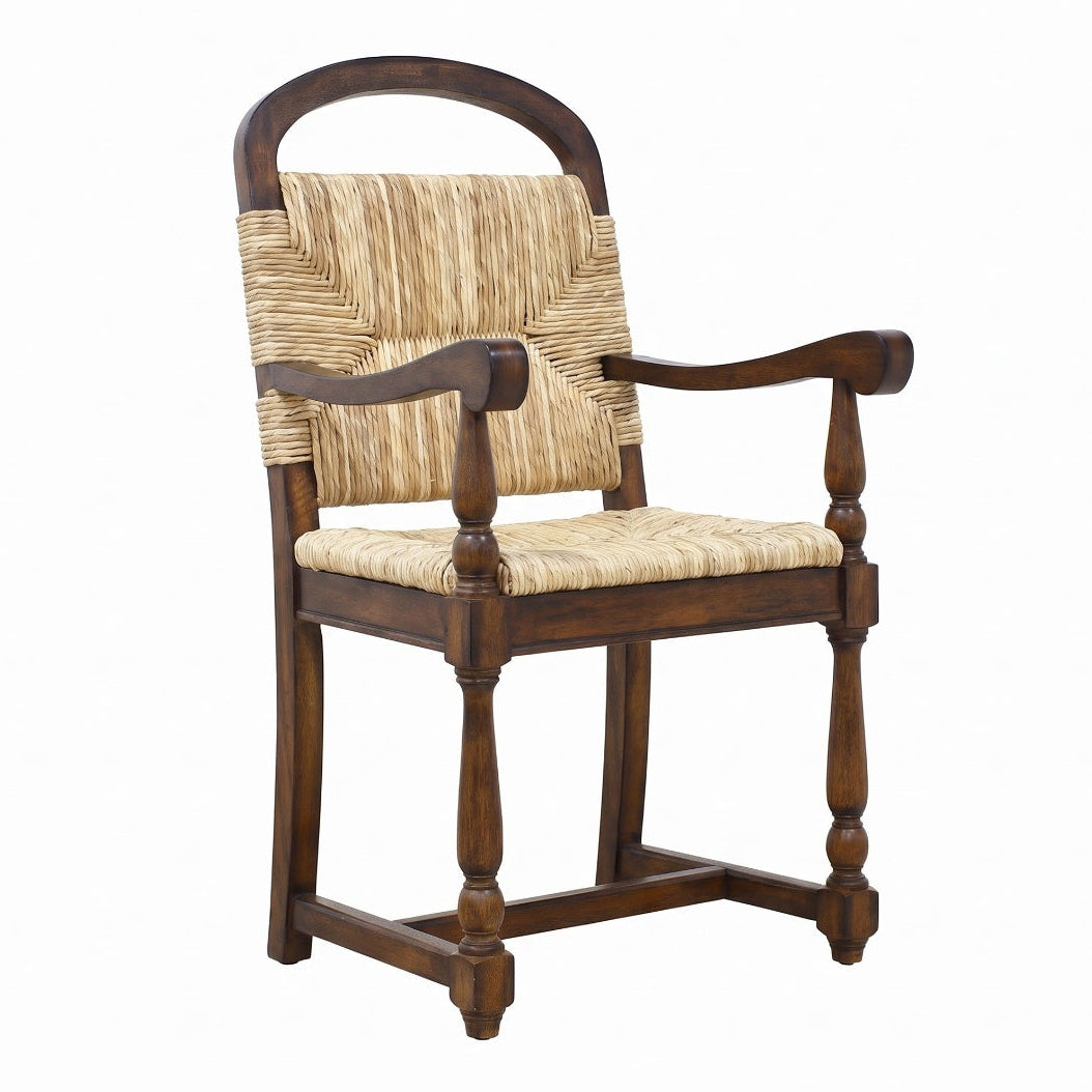 Marceau mango wood dining chair with woven natural fiber seat, arched backrest, and turned legs.
