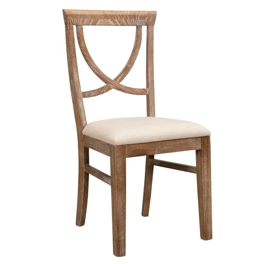 Rustic wooden dining chair with cream upholstered seat and X-back design, perfect for farmhouse or shabby chic decor