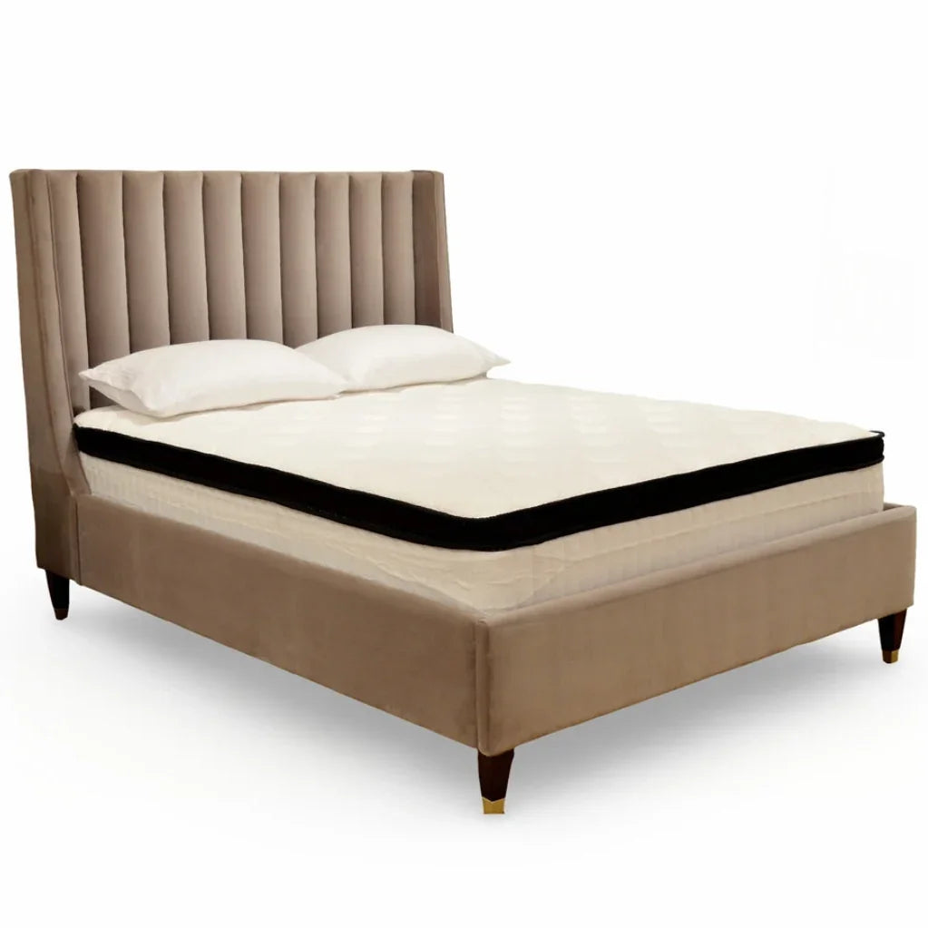 Beige tufted velvet bed frame with white mattress and pillows, farmhouse style bedroom furniture