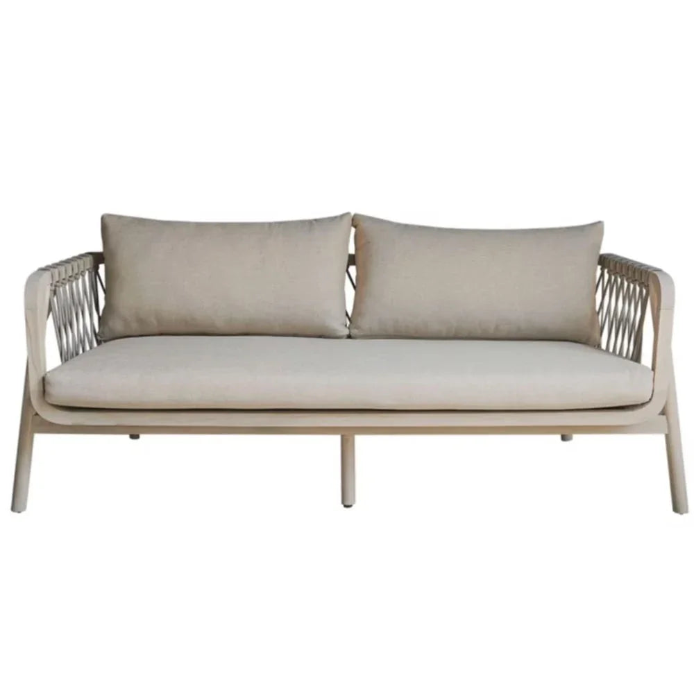 Modern coastal sofa with beige cushions and white rope-detailed frame