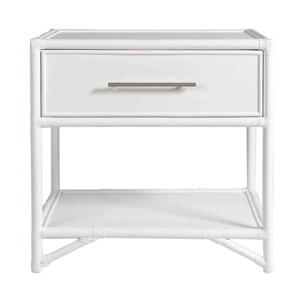 White coastal style rattan nightstand with a single drawer and lower open shelf.