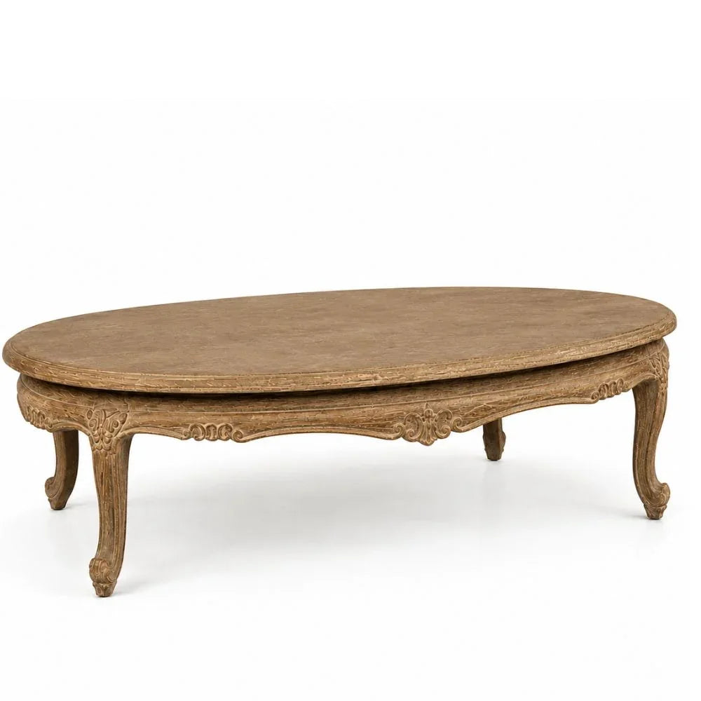 Elegant oval coffee table with ornate carvings in French country style