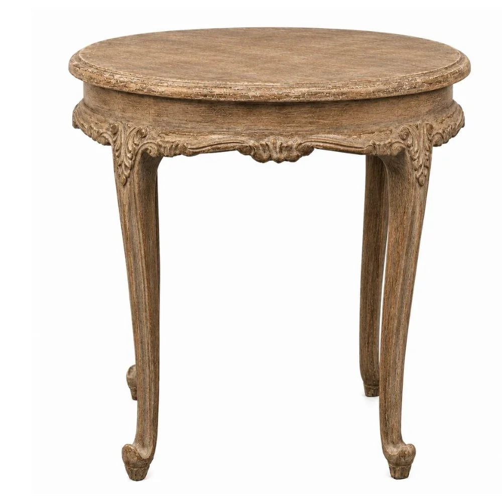 Round French country side table with carved legs and rustic wood finish