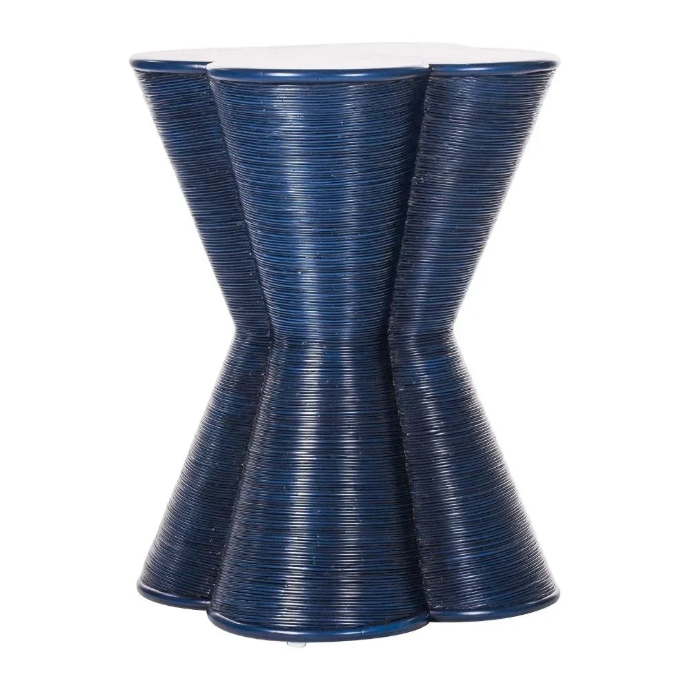 Navy blue ribbed hourglass side table with a white top in a modern coastal style.
