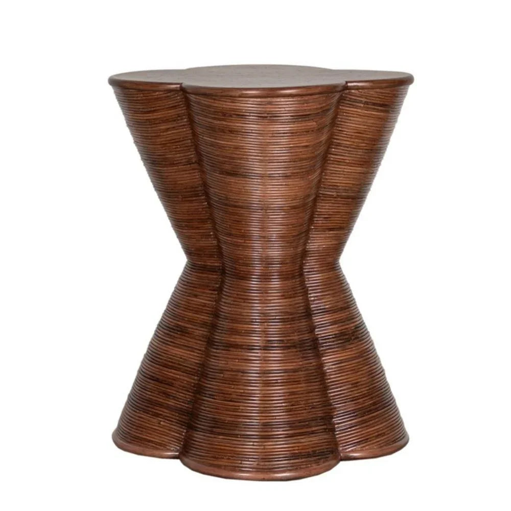 Brown textured hourglass-shaped side table in a natural boho style.