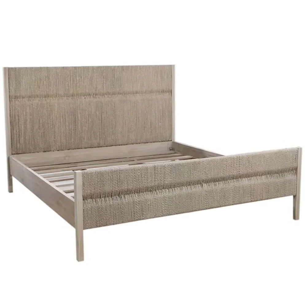 Natural boho style bed frame with textured neutral fabric headboard and footboard.