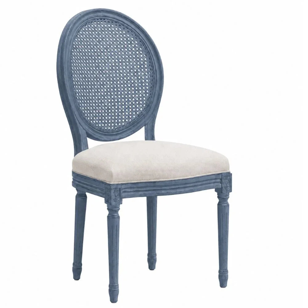 Blue French country style oval back chair with cane detailing and cream cushion.