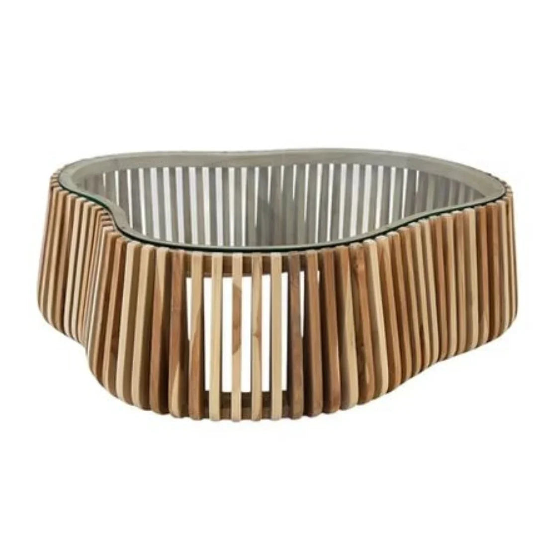 Natural wood slat coffee table with a curved glass top in a coastal boho style.