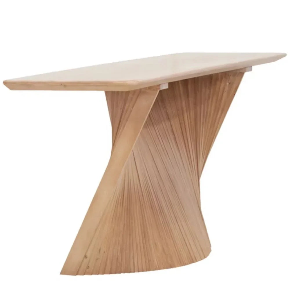 Natural wood sculptural dining table with a twisted pedestal base in a boho style.