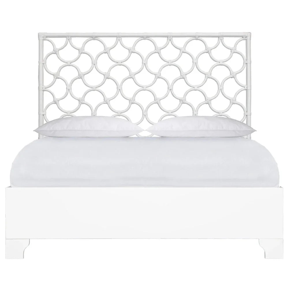 White coastal style bamboo rattan headboard bed frame with interlocking circle design.