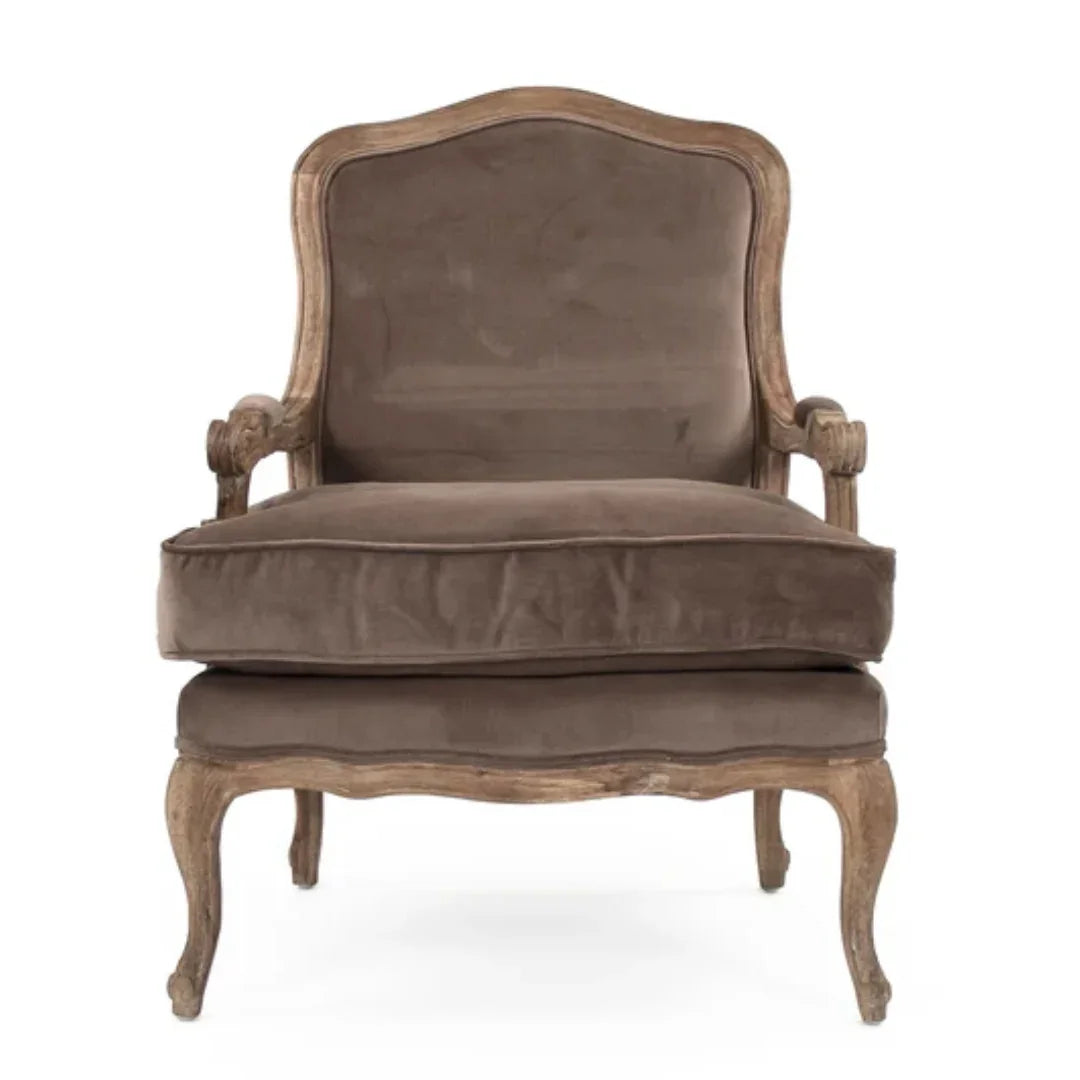 French country armchair with distressed wood frame and taupe velvet upholstery, elegant curved legs