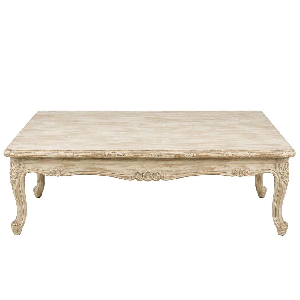 Distressed cream French country coffee table with ornate carved legs and shabby chic finish