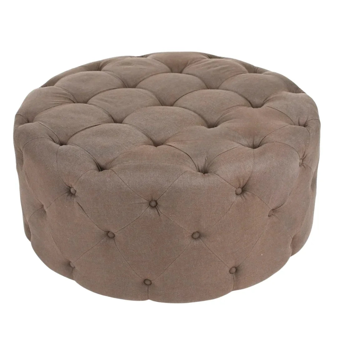 Tufted taupe round ottoman pouf in a French country style