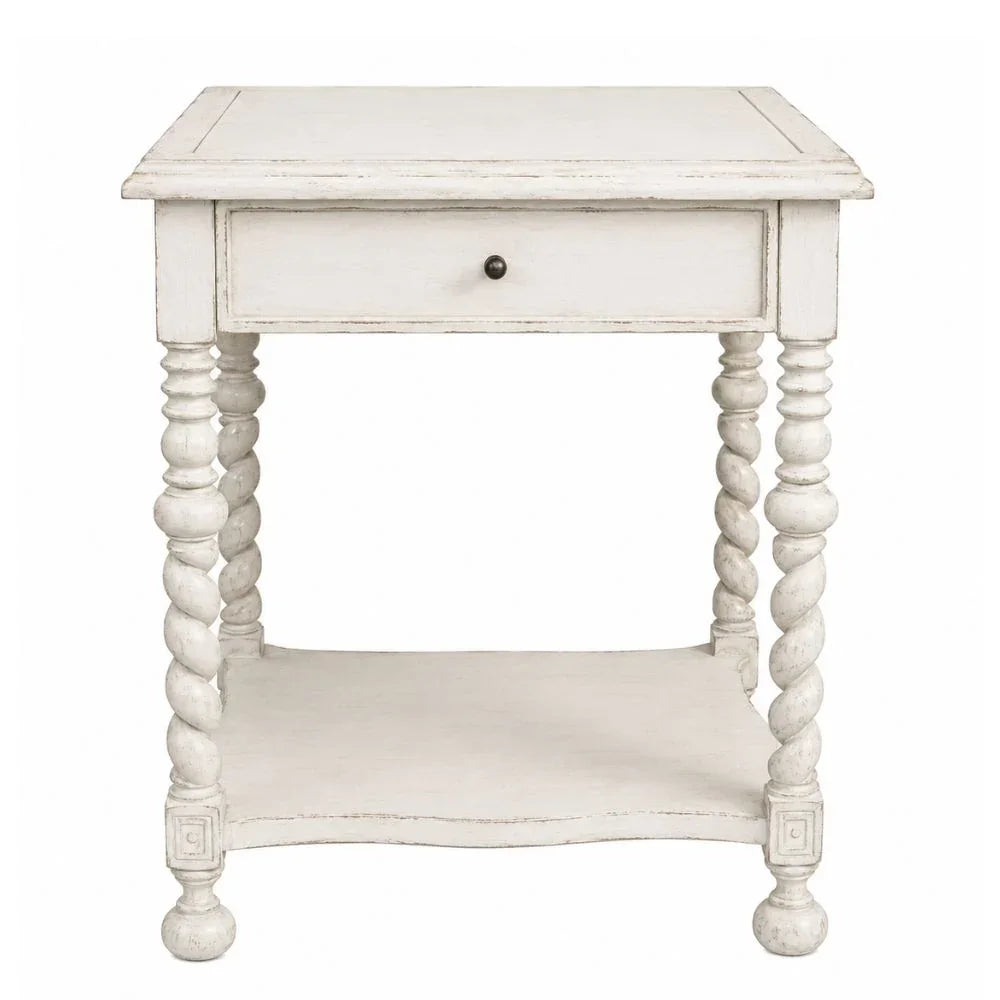 White shabby chic end table with twisted spindle legs, single drawer, and bottom shelf.