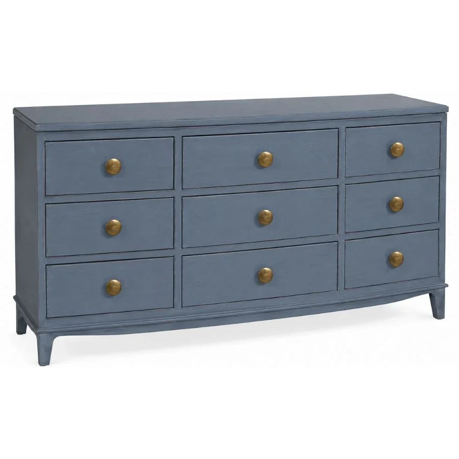 Blue French country style dresser with nine drawers and gold knobs.