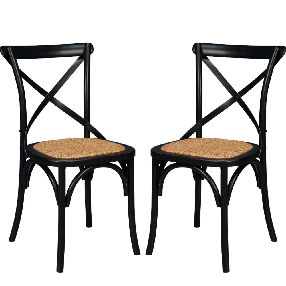 Black X-back dining chairs with woven rush seats, farmhouse style