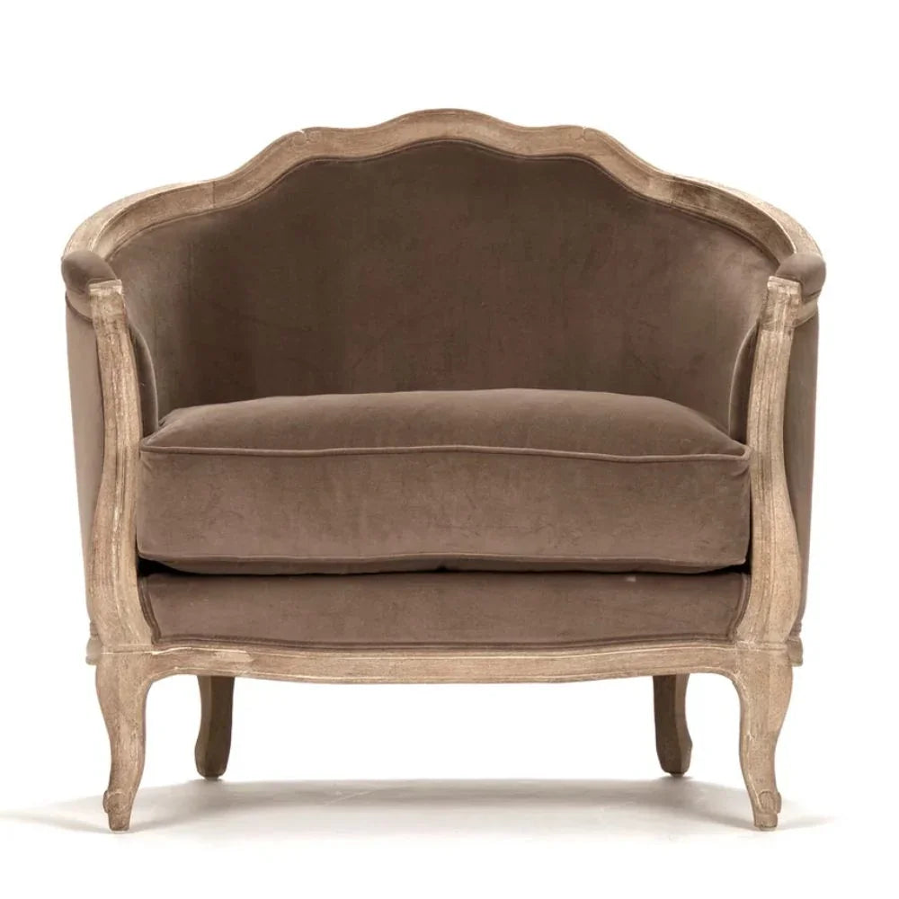 Elegant French country armchair with distressed wood frame and plush brown velvet upholstery