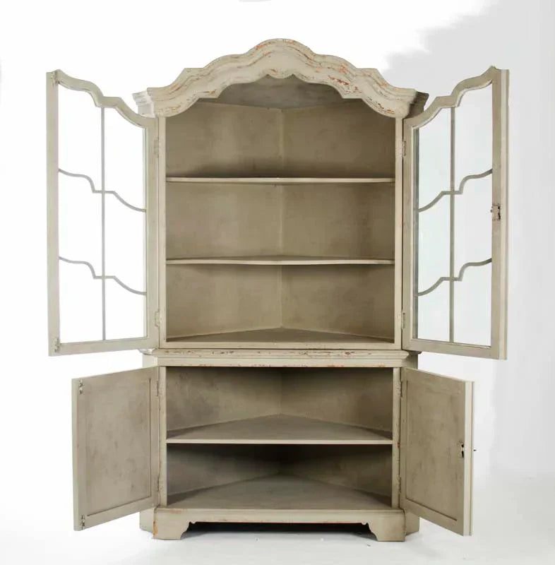 Shabby chic corner cabinet with distressed finish, glass-paneled doors, and open shelving for farmhouse decor