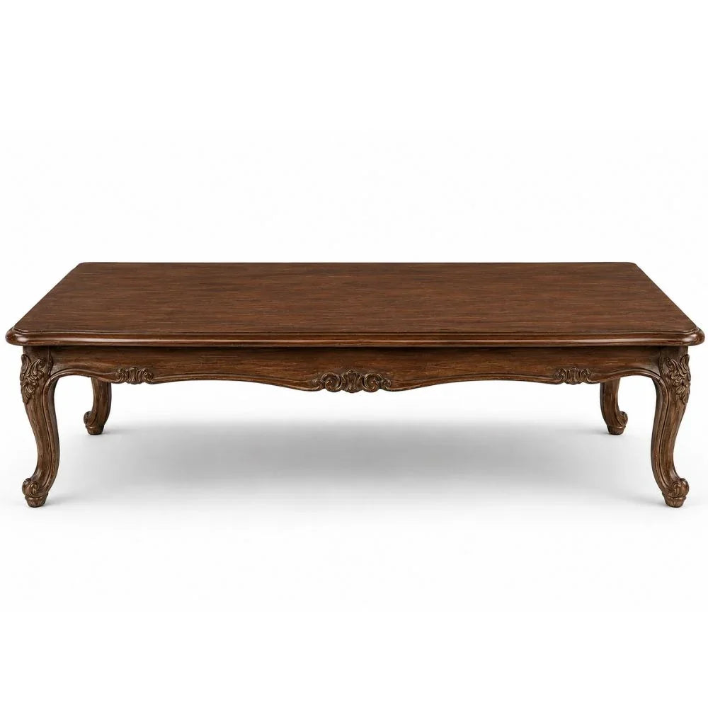 Elegant French country coffee table with carved legs and rich wood finish