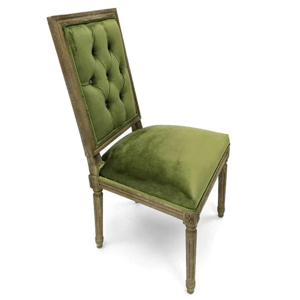 Green velvet tufted dining chair with distressed wood frame, French country style