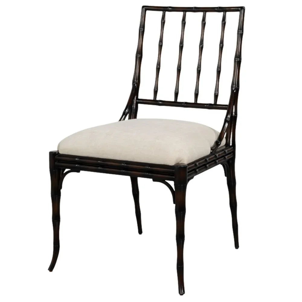 Dark bamboo-style dining chair with cream upholstered seat, perfect for French country or coastal decor