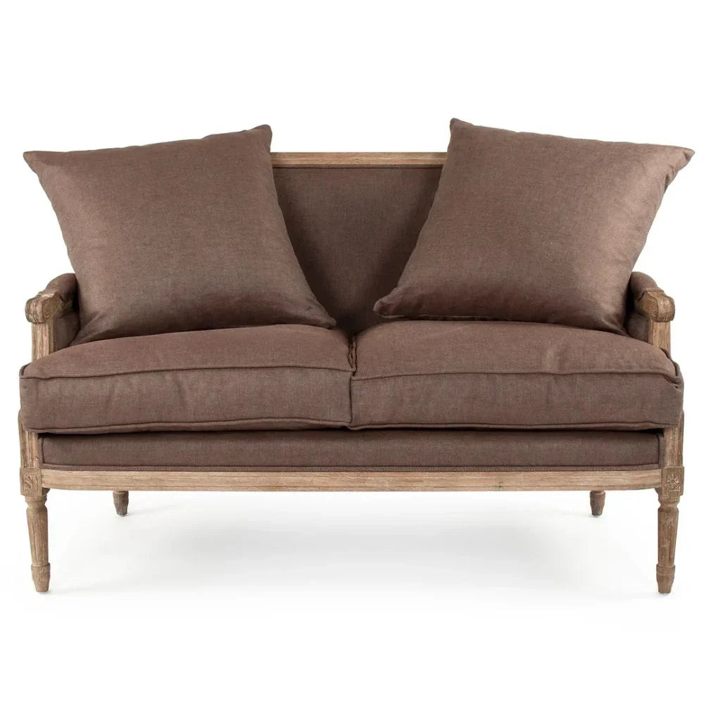 French country loveseat with distressed wood frame and brown linen cushions, perfect for shabby chic or farmhouse decor