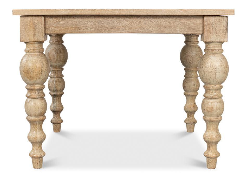 Natural wood French country style dining table with carved turned legs