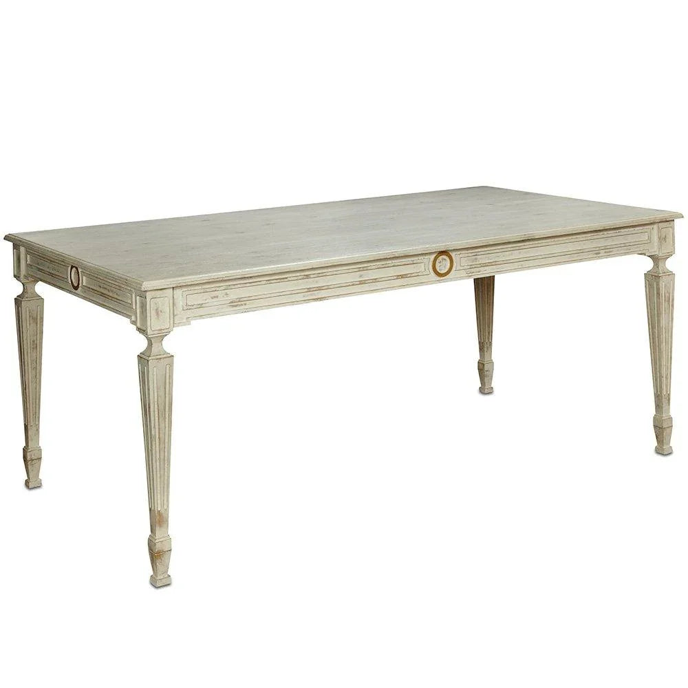 Elegant French country dining table with distressed finish and gold accents, perfect for shabby chic or farmhouse decor.