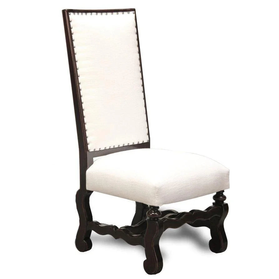 Elegant French country dining chair with dark wood frame, white upholstered seat and back, nailhead trim details