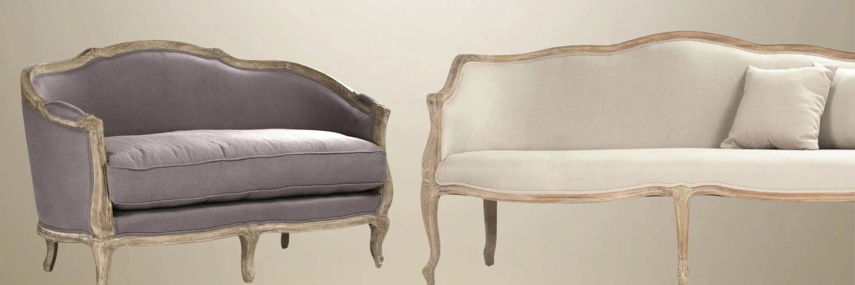 French country-style settee and sofa with distressed wood frames, upholstered in gray and cream fabric