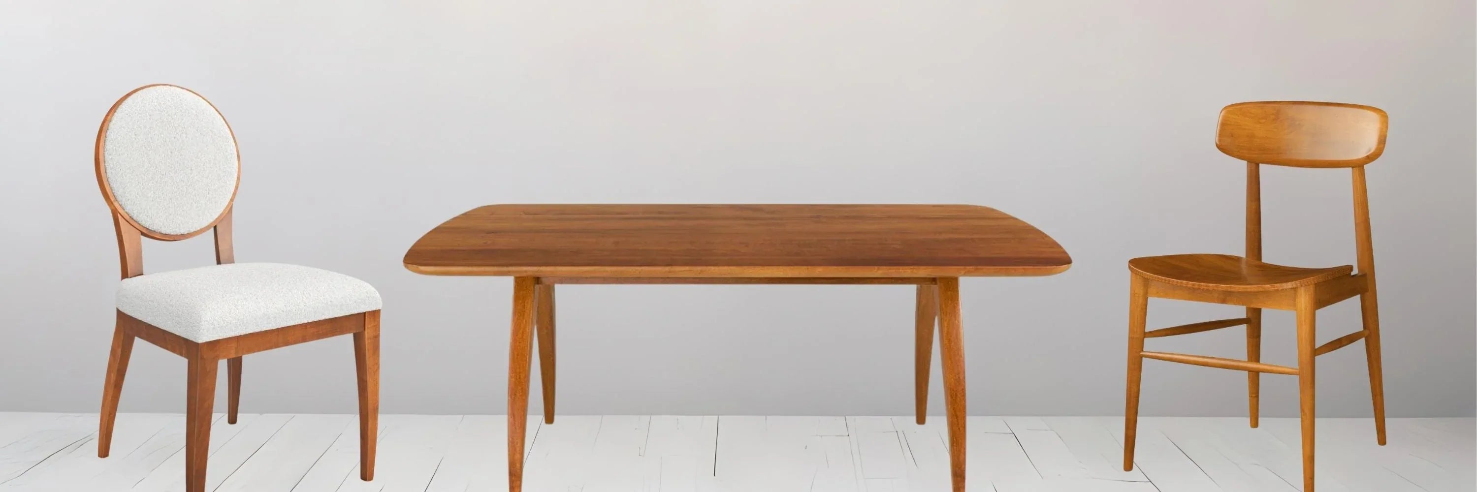 Mid-century modern wooden dining table with two chairs, one upholstered, in farmhouse style