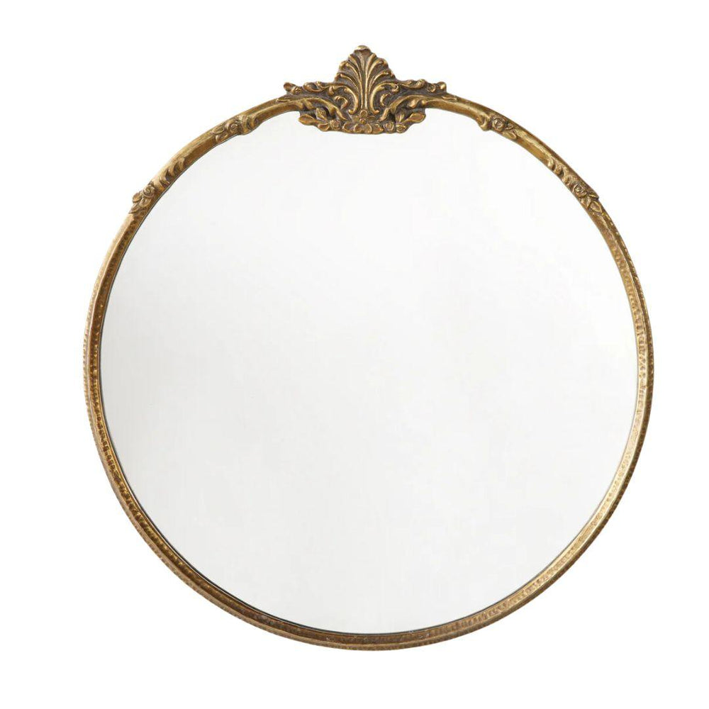 Round gold French country style wall mirror with ornate carved top crest