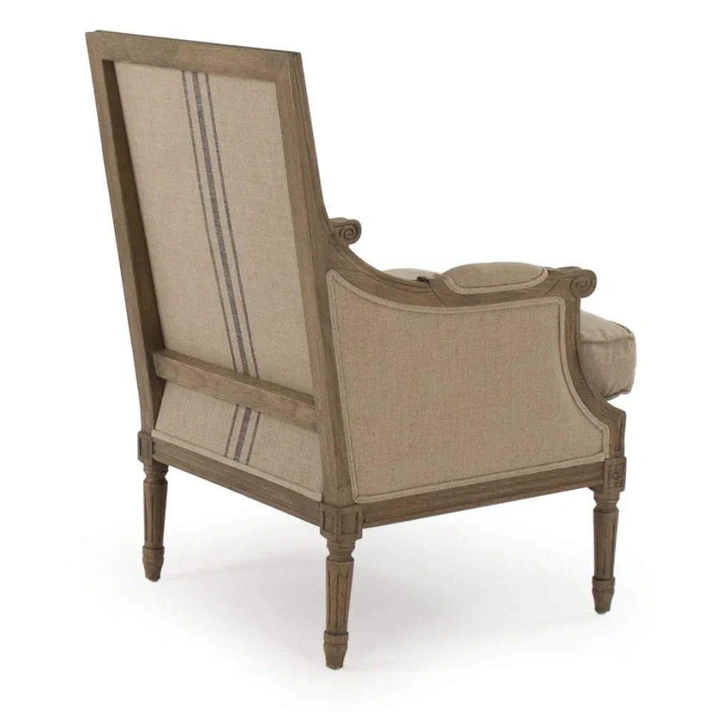 French country armchair with striped upholstery and carved wood frame