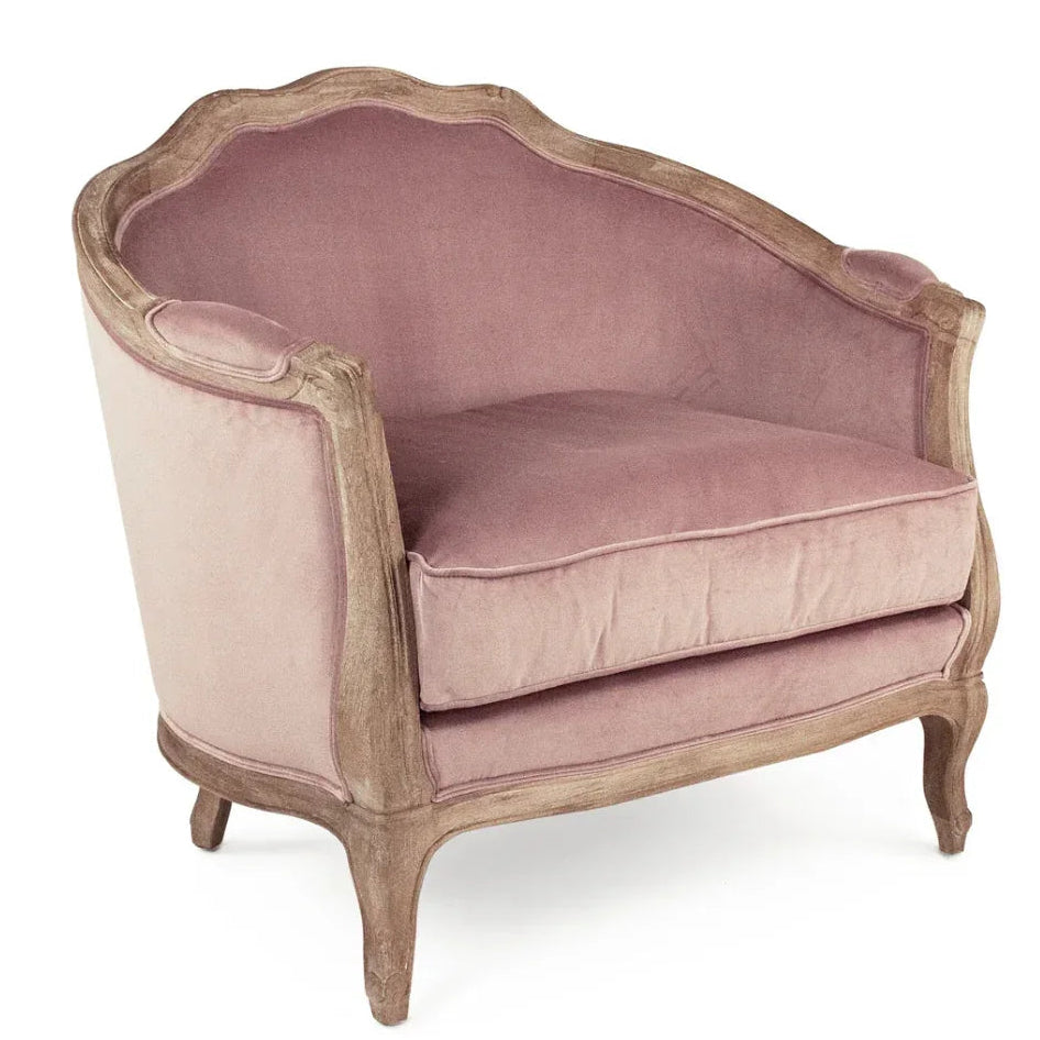 Pink velvet French country armchair with distressed wood frame and curved legs