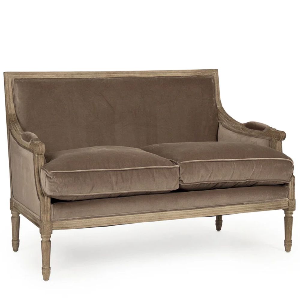 French country velvet loveseat with distressed wood frame and rolled arms, perfect for shabby chic or farmhouse decor