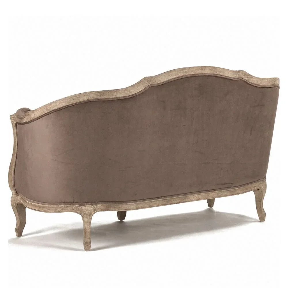 French country style sofa with curved back and distressed wood frame in shabby chic design