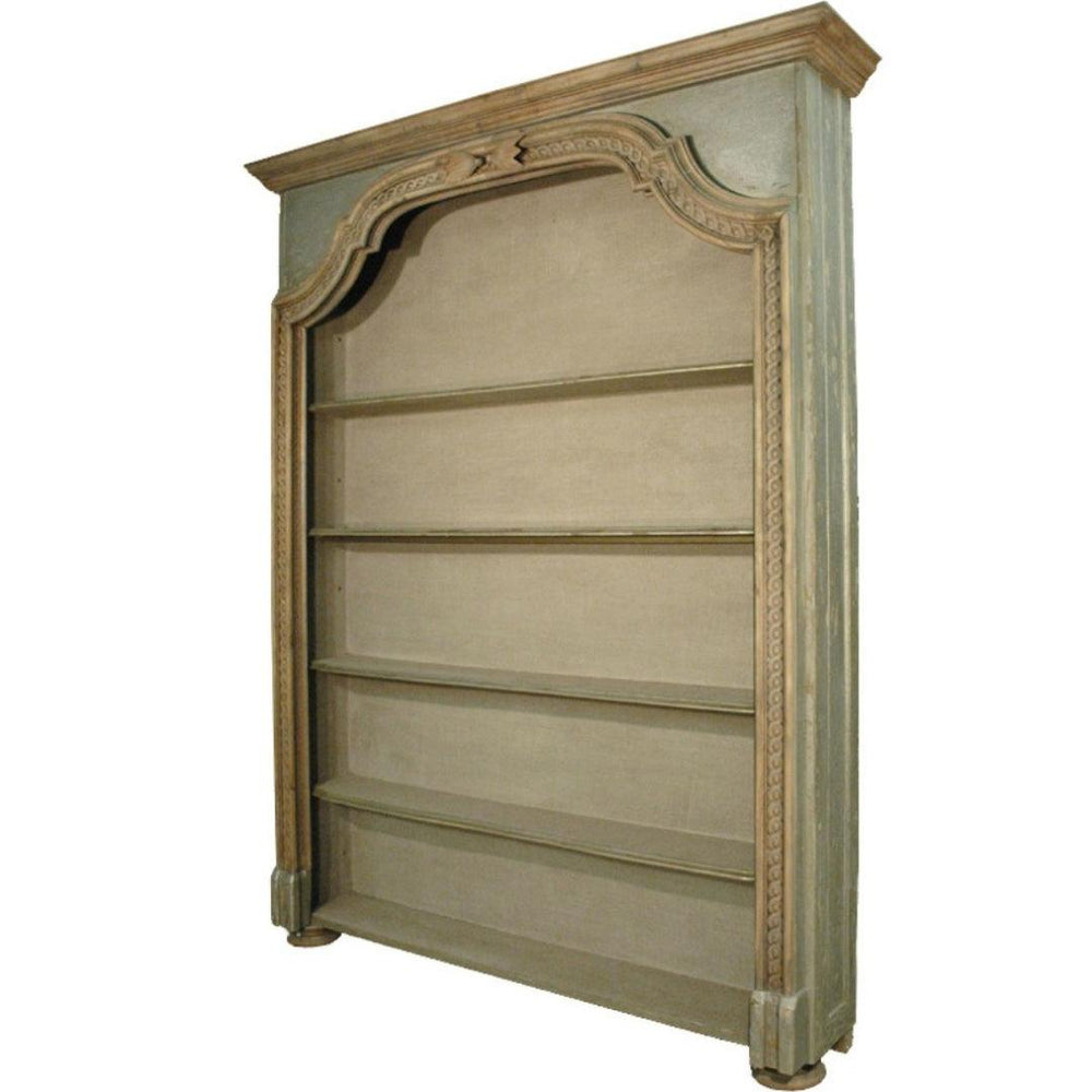 Elegant French country bookshelf with ornate detailing and distressed finish