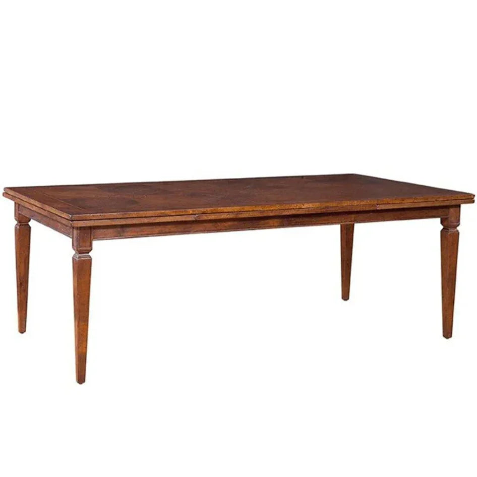 Rustic wooden dining table with tapered legs, perfect for farmhouse or French country decor